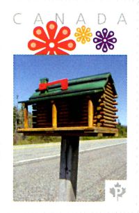 Picture Postage stamp showing folk art mailbox shaped as a cabin