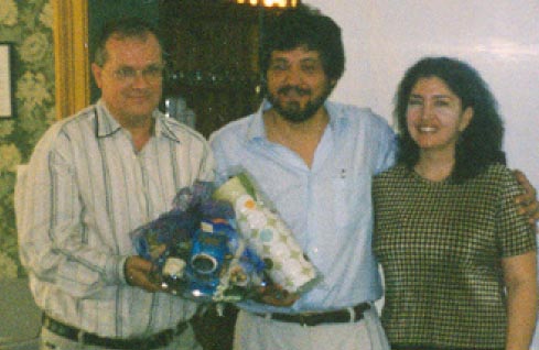 Jim Watt presents gifts to Jorge and Imelda Peral