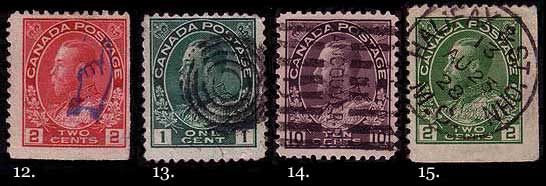 Four stamps with cancels.  Item 1 is a 2 cent carmine with a small 
        'Return to sender' hand; item 2 is a 1 cent green with a four ring 
        cancel; item 3 is a 10 cent plum with a roller cancel; and item 4 
        is a 2 cent green with an RPO cancel.
